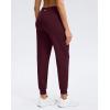 imageG Gradual Womens Joggers Zip Pockets Drawstring Gym Sweatpants High Waisted Tapered Pants for Workout Travel LoungeWine