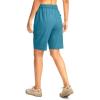 imageWomens 10quot Hiking Golf Long Shorts with 5 Pockets Knee Length Lightweight Quick Dry Cargo Bermuda Shorts for WomenBlue