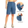 imageWomens 10quot Hiking Golf Long Shorts with 5 Pockets Knee Length Lightweight Quick Dry Cargo Bermuda Shorts for WomenSlate Blue