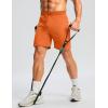 imageG Gradual Mens Workout Shorts with Zipper Pockets 7 Lightweight Quick Dry Athletic Gym Running Shorts for MenOrange