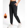 imageG Gradual Womens Fleece Lined Joggers with Zipper Pocket Water Resistant Running Hiking Pants Winter Warm Thermal SweatpantsBlack
