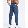 imageMens Cotton Fleece Lined Joggers with Zipper Pockets Athletic Workout Gym Lounge Sweatpants Winter Warm PantsPeacock Blue