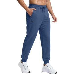 imageMens Cotton Fleece Lined Joggers with Zipper Pockets Athletic Workout Gym Lounge Sweatpants Winter Warm PantsPeacock Blue