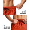 imageMens Swim Trunks No Liner 9 Board Shorts Quick Dry Bathing Suit Swimming Beach Shorts for Men with 3 PocketsOrange