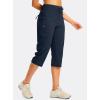 imageG GRADUAL Womens Capri Pants with 3 Zipper Pockets Lightweight Quick Dry Hiking Travel Capris Pants for Women Casual SummerNavy