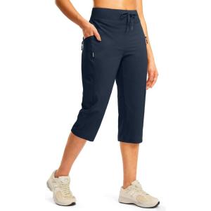 imageG GRADUAL Womens Capri Pants with 3 Zipper Pockets Lightweight Quick Dry Hiking Travel Capris Pants for Women Casual SummerNavy